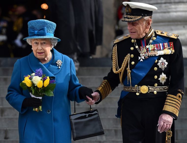 Queen-Holding-Hands-With-Husband