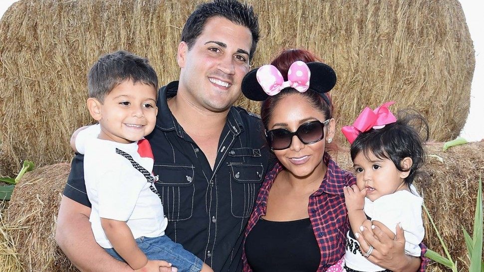 Snookie, husband and kids.